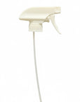 White spray nozzle replacement part with white hose on a white background