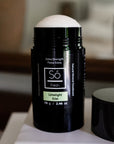 Black deodorant stick with 'Só Fresh Extra-Strength Limelight" branding on a blurred background