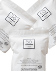 Three white stand-up pouches of Só Clean Powdered Laundry Soda arranged on a white background, with the front pouch fully visible and the two rear pouches partially cropped.