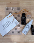 Teacher Gift Bundle on Wood Surface with Essential Oil Diffuser Lip Balm and Hand Sanitizer