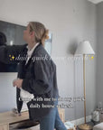 A video with a voiceover of a woman doing a daily refresh of her home using Só Luxury products in the kitchen and living room